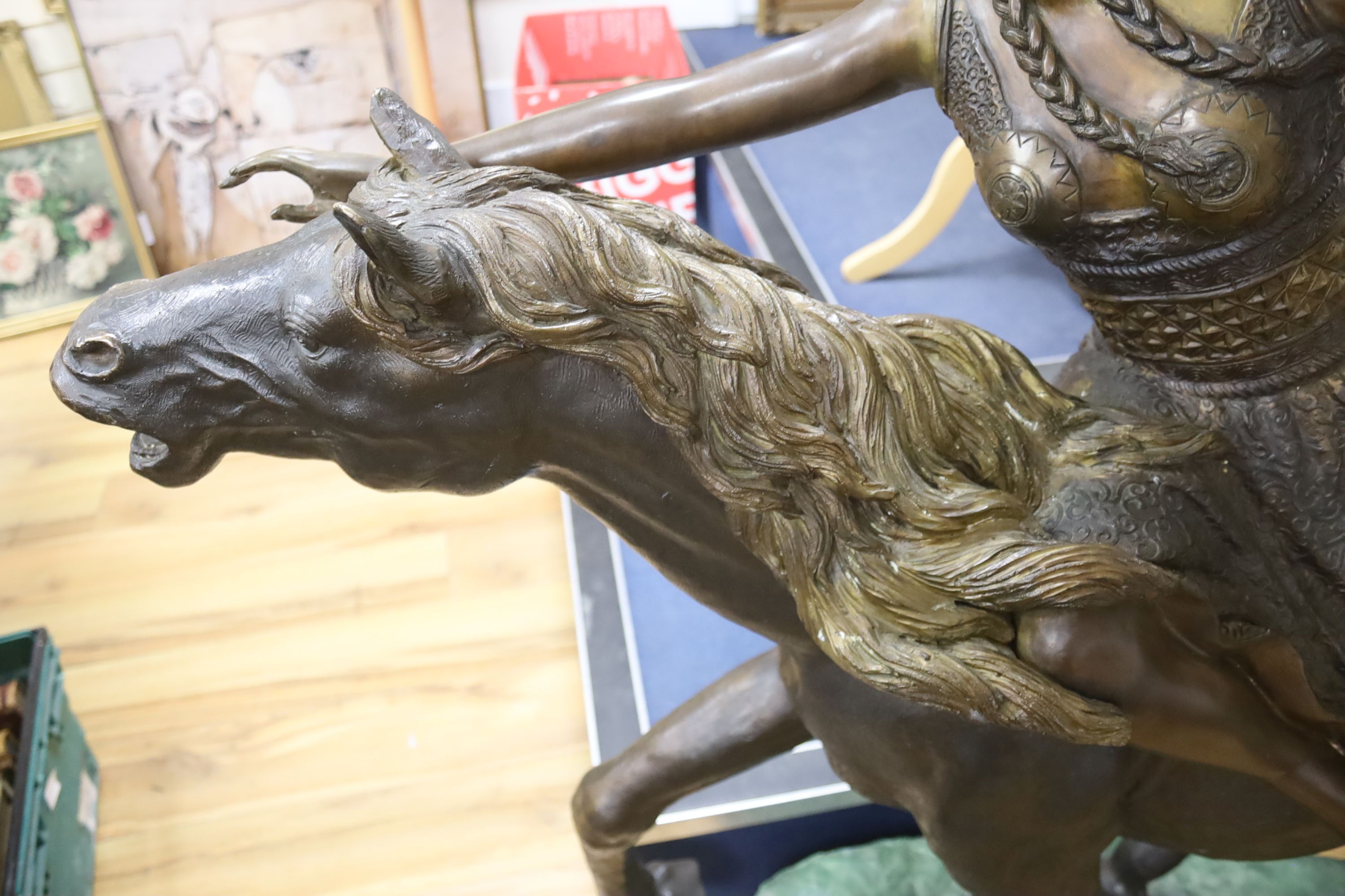 A large bronze of a Valkyrie on horseback, width 135cm height 122cm